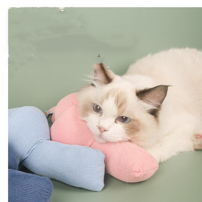 Light green knotted cat toy with a ribbed texture and a small tag, designed for biting and play. - Image 20