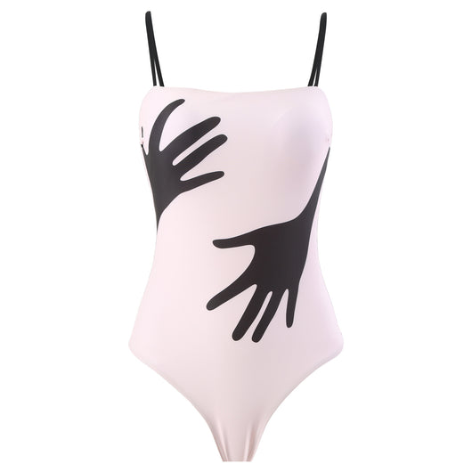 Women's light pink one-piece bikini with black handprint pattern and matching tie-waist sarong. - Image 20