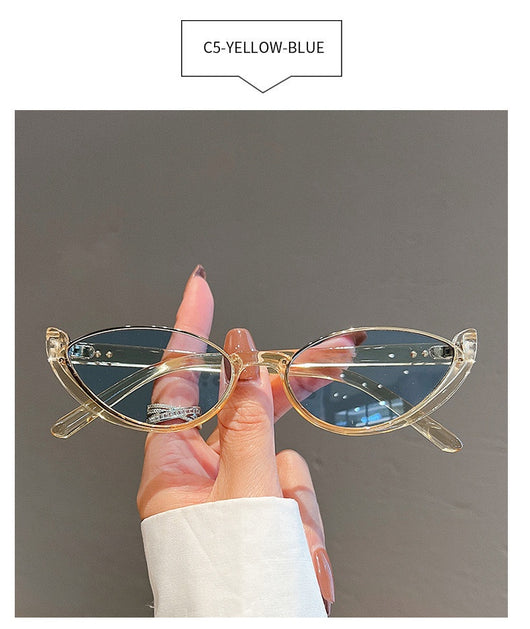 Pink cat-eye sunglasses with purple gradient lenses on a white background, showcasing a trendy style. - Image 17