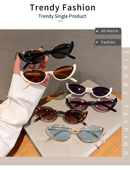 Pink cat-eye sunglasses with purple gradient lenses on a white background, showcasing a trendy style. - Image 26