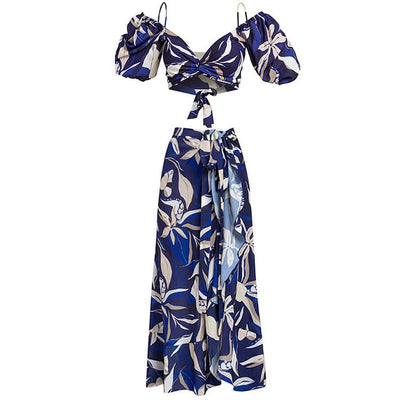 Women's blue and white tropical leaf print two-piece swimsuit with off-shoulder puff sleeves and high-waisted bottoms. - Image 16