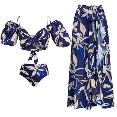 Women's blue and white tropical leaf print two-piece swimsuit with off-shoulder puff sleeves and high-waisted bottoms. - Image 20
