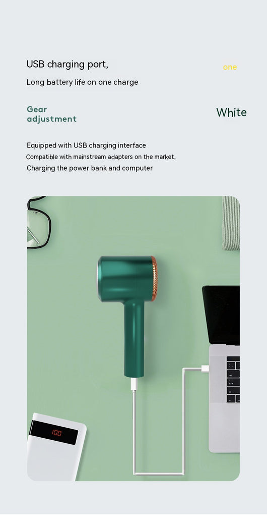 White electric lint remover with a perforated metal screen and a brown textured accent band. - Image 23