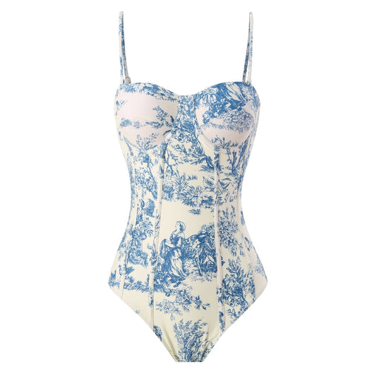 White sarong with blue toile de Jouy pattern featuring nature scenes, tied at the waist with a solid blue sash. - Image 18