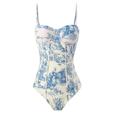 White sarong with blue toile de Jouy pattern featuring nature scenes, tied at the waist with a solid blue sash. - Image 18