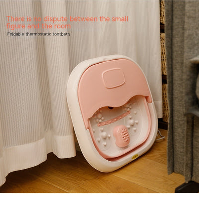 Gray and white collapsible foot spa basin with heating function, massage nubs, and a partial lid. - Image 9