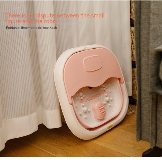 Gray and white collapsible foot spa basin with heating function, massage nubs, and a partial lid. - Image 9