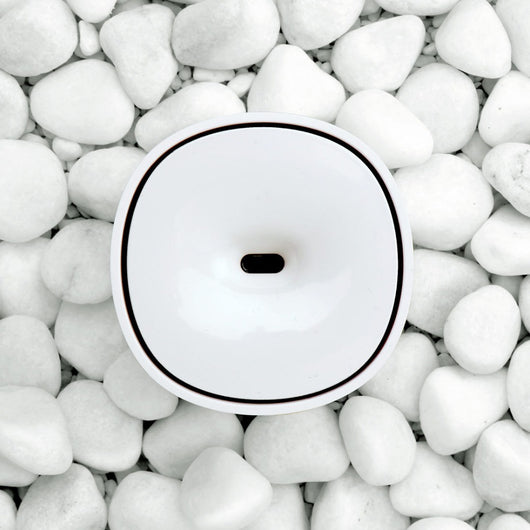 White mini aromatherapy machine with a minimalist design, featuring a top mist outlet and a single control button. - Image 10