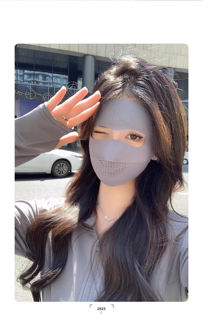 Light blue ice silk face mask with breathable perforations and adjustable ear loops for sun protection. - Image 23