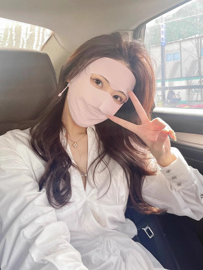 Light blue ice silk face mask with breathable perforations and adjustable ear loops for sun protection. - Image 31