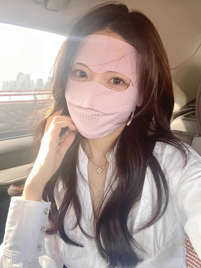 Light blue ice silk face mask with breathable perforations and adjustable ear loops for sun protection. - Image 40
