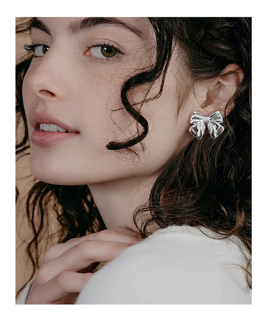 Aretes de Moño Estilo Europeo y Americano con Baño de Cobre 18K - Image 13
