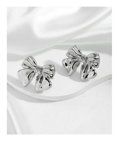 Aretes de Moño Estilo Europeo y Americano con Baño de Cobre 18K - Image 14