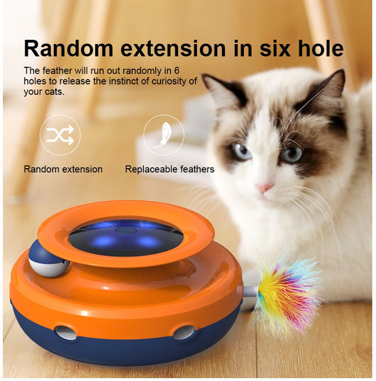 Grey and white cat observing a blue electric cat toy with a feather attachment and glowing blue lights. - Image 10