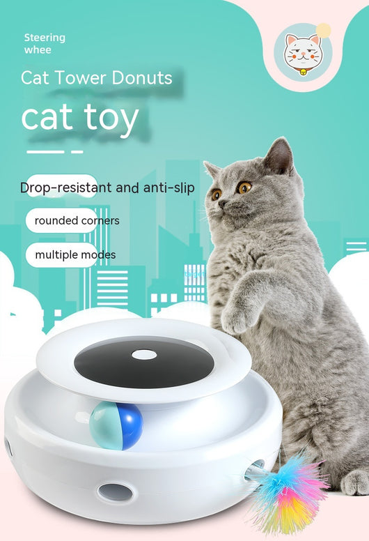 Grey and white cat observing a blue electric cat toy with a feather attachment and glowing blue lights. - Image 15