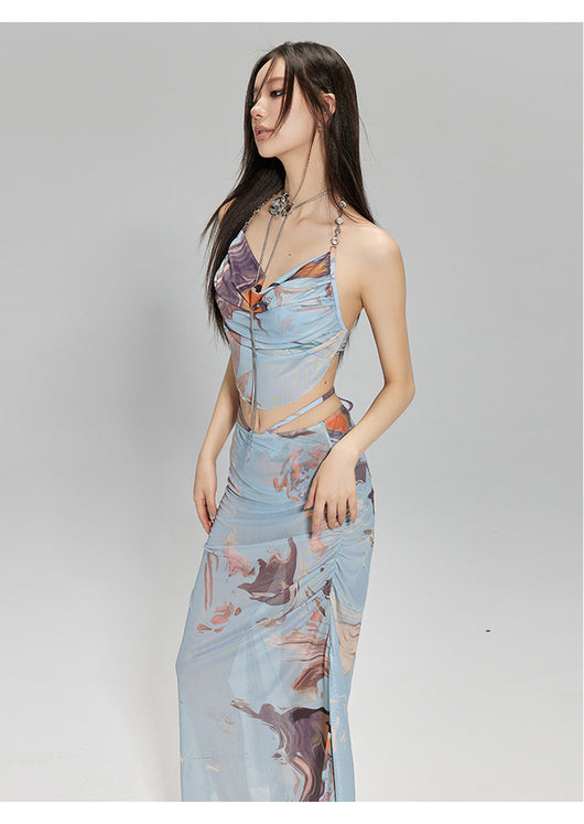 Light blue abstract print two-piece bikini set with a cropped halter top featuring chain straps and a ruched maxi skirt. - Image 9