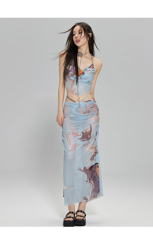 Light blue abstract print two-piece bikini set with a cropped halter top featuring chain straps and a ruched maxi skirt. - Image 11