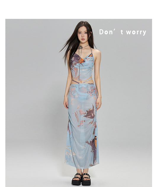Light blue abstract print two-piece bikini set with a cropped halter top featuring chain straps and a ruched maxi skirt. - Image 23