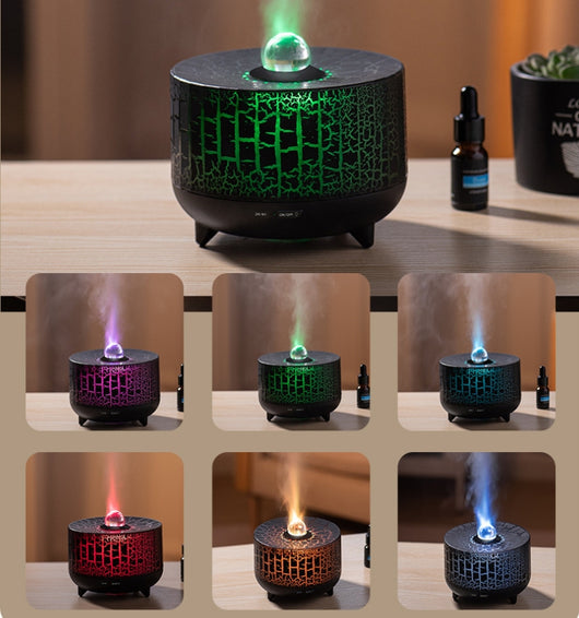 Black cylindrical aromatherapy diffuser with a crackle pattern, clear spherical top, and control buttons for timer and light. - Image 7