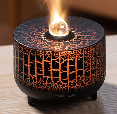 Black cylindrical aromatherapy diffuser with a crackle pattern, clear spherical top, and control buttons for timer and light. - Image 15
