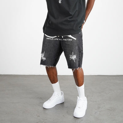 Shorts Denim Destructivo con Efecto Graffiti - Image 11