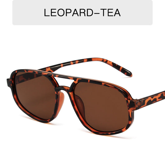 Men's fashion tortoise shell double beam sunglasses with brown oval lenses on a white background. - Image 25