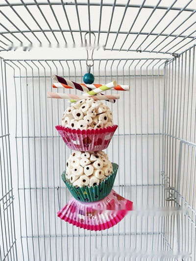 Two parrot shredding toys, shaped like cupcakes with paper straws, featuring colorful paper cups and a metal clasp. - Image 23