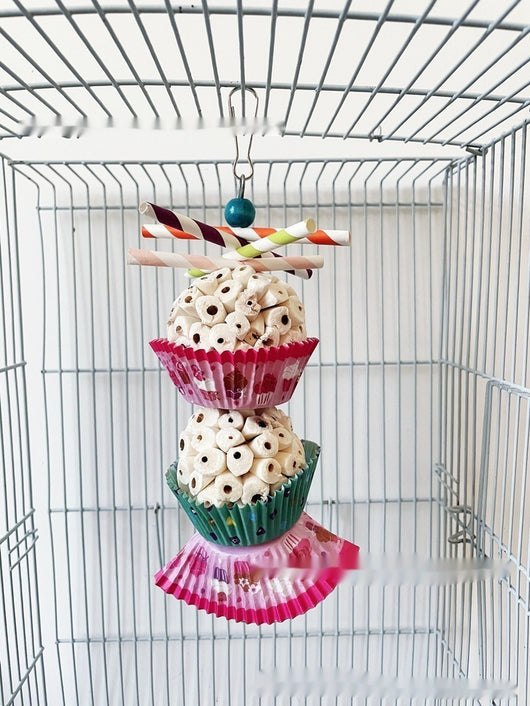Two parrot shredding toys, shaped like cupcakes with paper straws, featuring colorful paper cups and a metal clasp. - Image 23