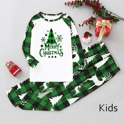 Matching family Christmas pajamas in green and white plaid with deer and Christmas tree graphics. - Image 42