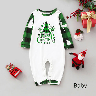 Matching family Christmas pajamas in green and white plaid with deer and Christmas tree graphics. - Image 43