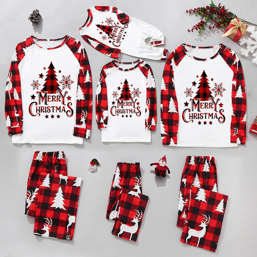 Matching family Christmas pajamas in green and white plaid with deer and Christmas tree graphics. - Image 47