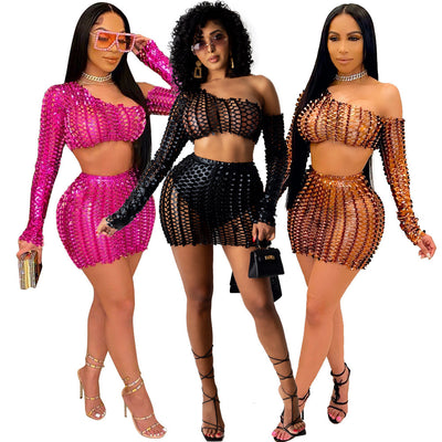 Black net hole hollow-out two-piece set with one-shoulder long-sleeve crop top and matching mini skirt. - Image 65