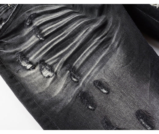 Jeans Vintage Desgastado con Parches y Roturas - Image 10