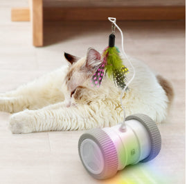 Automatic cat teasing toy with a white roller base and gray wheels, featuring a colorful feather attachment. - Image 11