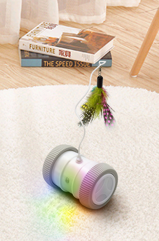 Automatic cat teasing toy with a white roller base and gray wheels, featuring a colorful feather attachment. - Image 13