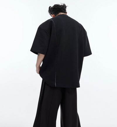 Camiseta Oversize con Hombros Acolchados y Diseño Deconstruido - Image 8