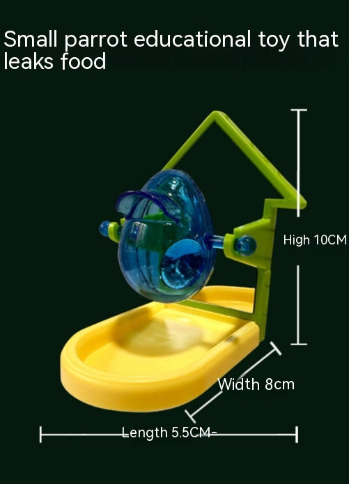 Small blue, yellow, and green parrot food leakage toy with a rotating dispenser and catch tray. - Image 12