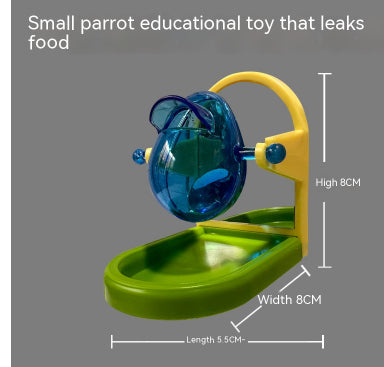 Small blue, yellow, and green parrot food leakage toy with a rotating dispenser and catch tray. - Image 15