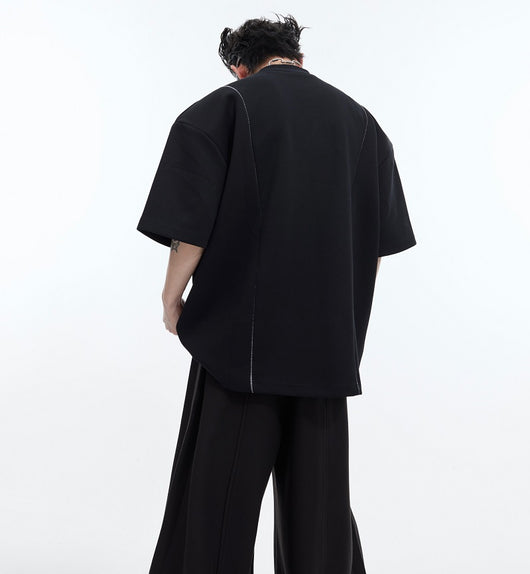 Camiseta Oversize con Hombros Acolchados y Diseño Deconstruido - Image 14