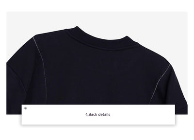 Camiseta Oversize con Hombros Acolchados y Diseño Deconstruido - Image 24
