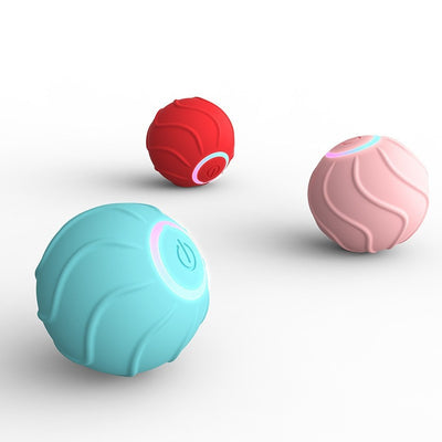 Red smart cat toy rolling ball with textured surface and glowing power button, designed for interactive play. - Image 10