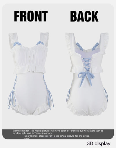 Women's white one-piece swimsuit with light blue lace-up sides, ruffled straps, and pearl-like buttons. - Image 31