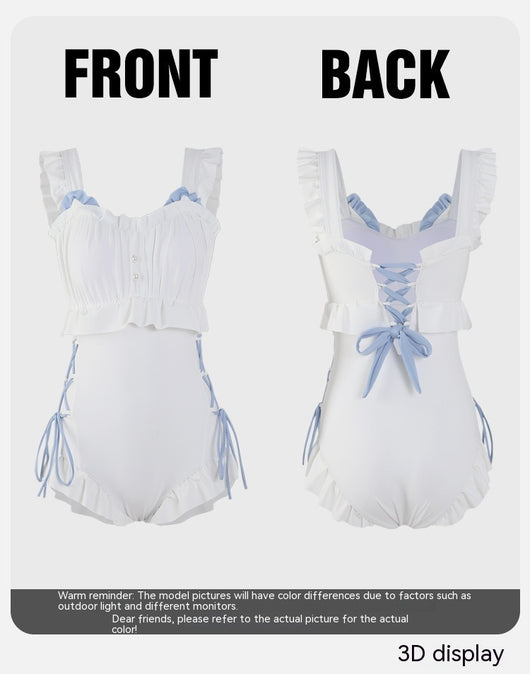 Women's white one-piece swimsuit with light blue lace-up sides, ruffled straps, and pearl-like buttons. - Image 31