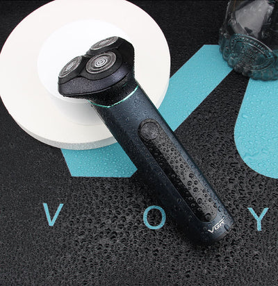 VGR men's electric rotary shaver with a dark teal metal body, LCD display, and three shaving heads. Includes USB cable, cleaning brush, travel pouch, and protec - Image 12