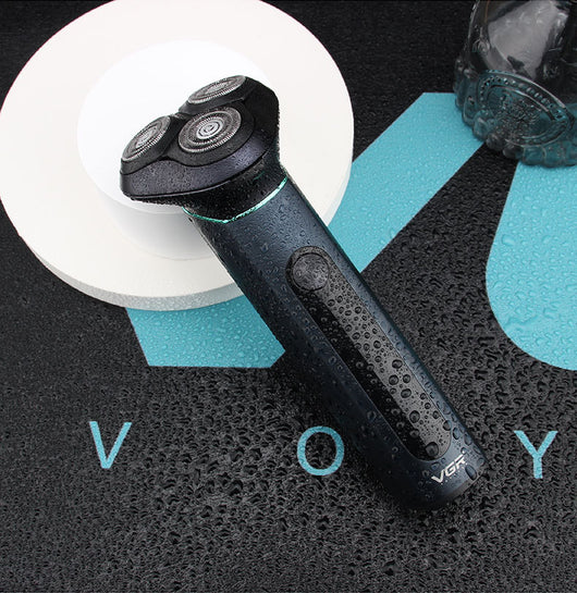 VGR men's electric rotary shaver with a dark teal metal body, LCD display, and three shaving heads. Includes USB cable, cleaning brush, travel pouch, and protec - Image 12