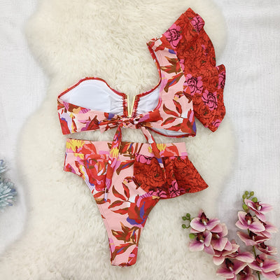 Women's one-shoulder ruffled bikini with a vibrant red and pink floral print, high-waisted bottoms. - Image 25