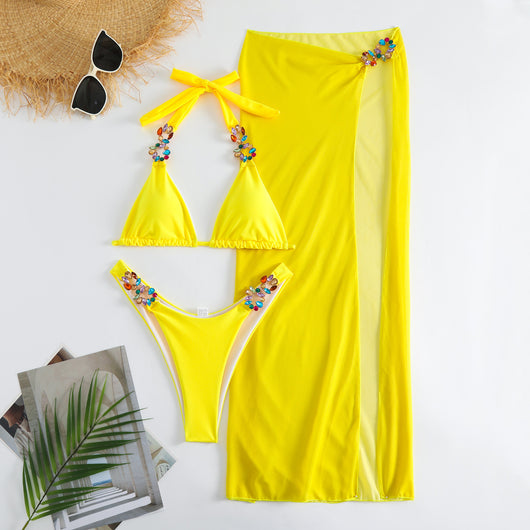 Yellow three-piece swimsuit with a halter bikini top, matching bottoms, and a long mesh skirt, all embellished with colorful rhinestones. - Image 14