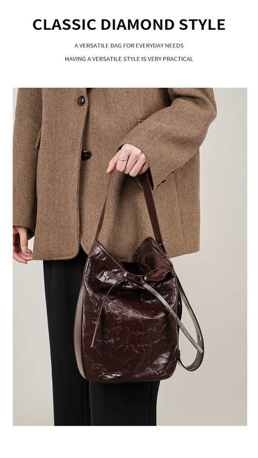 Bolso Bucket de Cuero con Patrón Texturizado y Asa Cruzada - Image 21