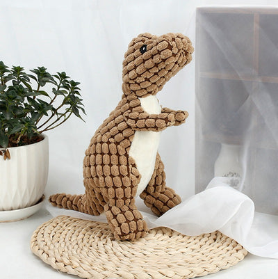 Brown textured corn velvet dinosaur plush toy with beige belly and black eyes, designed for dogs. - Image 17
