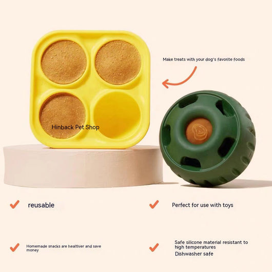 Green silicone dog treat dispensing toy ball next to a yellow silicone mold with three filled compartments. - Image 15